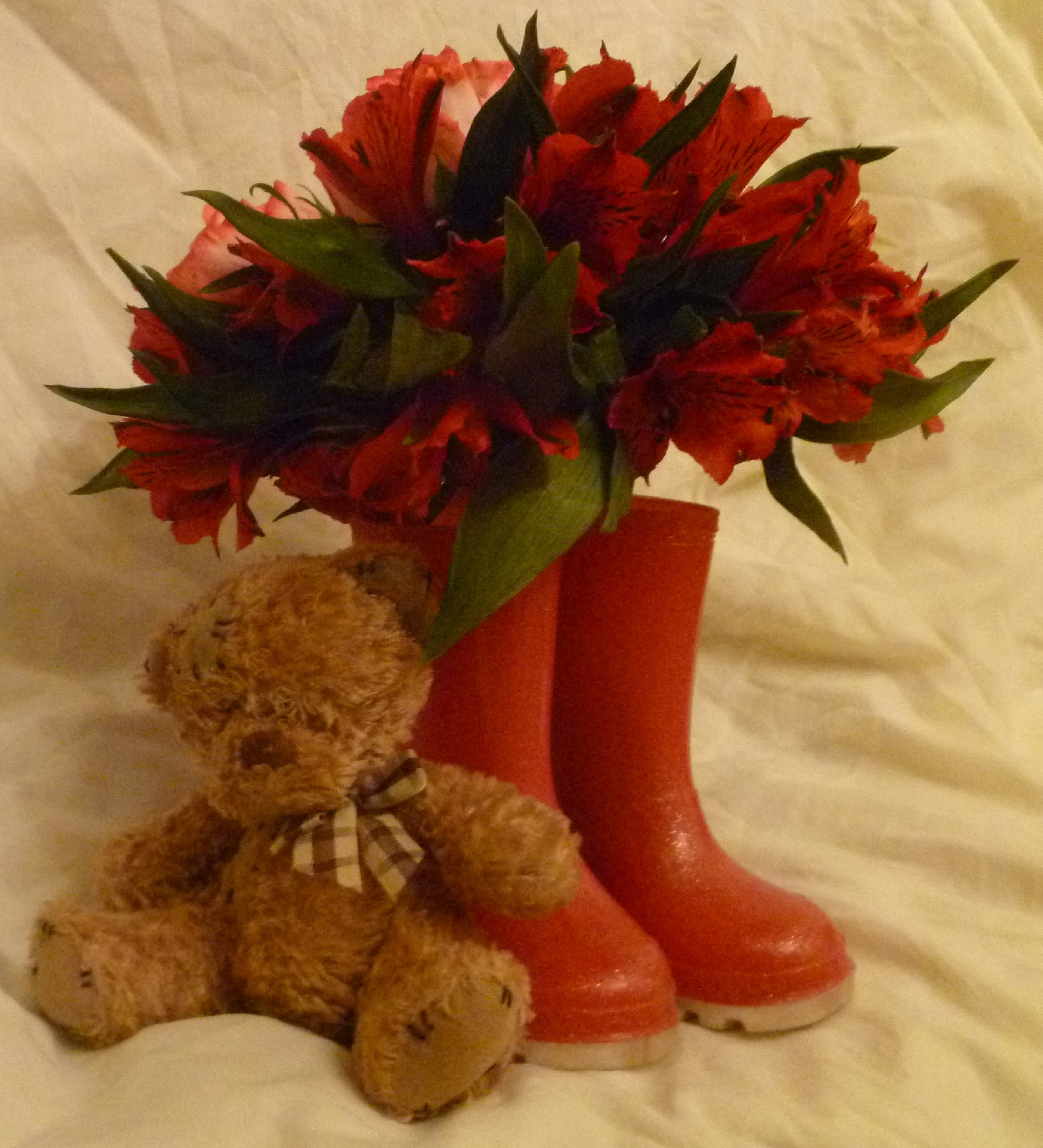 Oadby florist, Wigston florist, Leicester Contract & business flowers in boots with a teddy bear