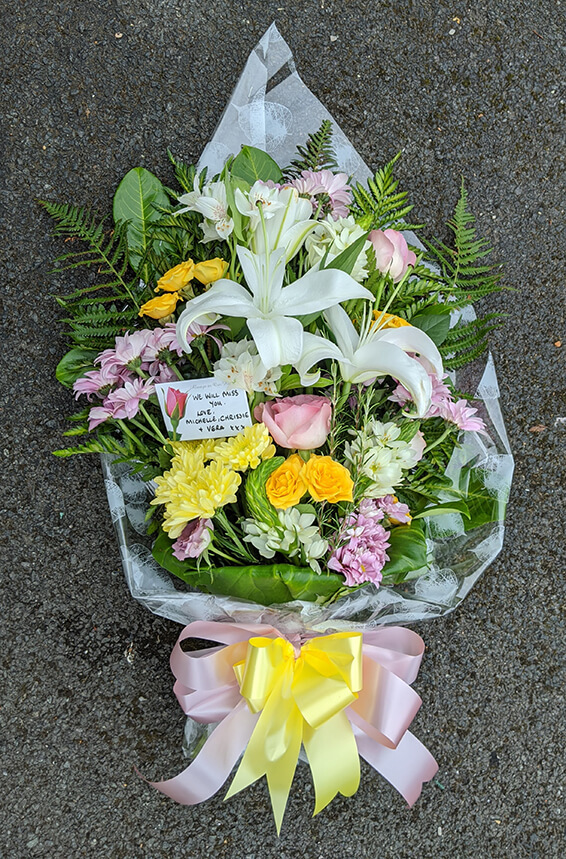 Oadby Funeral Flowers, Wigston Funeral Flowers, Market Harborough Funeral Flowers, Tied Sheaf Tribute with lilies & spray roses