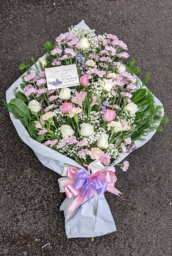 Oadby Funeral Flowers, Wigston Funeral Flowers, Market Harborough Funeral Flowers, Tied Sheaf Tribute with dainty pink & white flowers