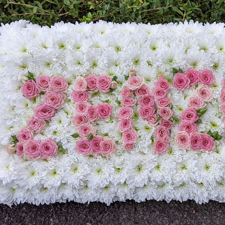 Market Harborough Funeral Flowers, Giant  floral letter tribute with blue & white spray, calligraphy style, very elegant.