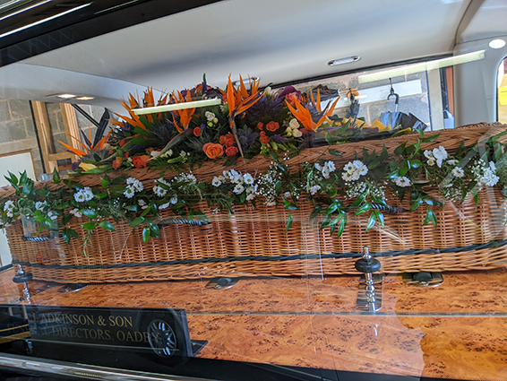 Oadby Funeral Flowers, Wigston Funeral flowers, Market Harborough Funeral Flowers, Leicester funeral flowers, Luxury garland for casket with Italian greenery, white daisies, rosemary & gypsophilla