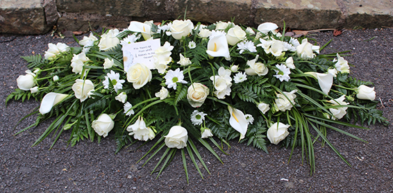 Oadby Funeral Flowers, Wigston Funeral Flowers, Leicester funeral flowers, All white flowers with calla lily casket spray