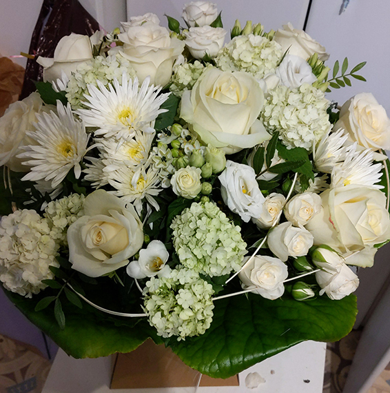 Oadby Funeral Flowers, Wigston Funeral Flowers, Market Harborough Funeral Flowers, Condolence Flower Bouquet, with white roses, white spray roses, Freesia & Viburnum Opulatus