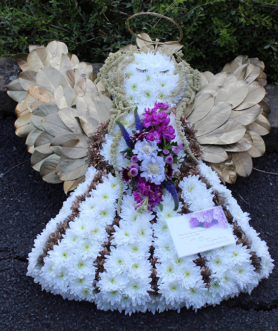 Oadby funeral flowers, Wigston funeral flowers, Market Harborough Funeral Flowers, Leicester Funeral Flowers, Bespoke Beautiful angel tribute made with flowers & with golden wings