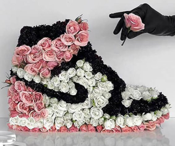 Oadby funeral flowers, Wigston funeral flowers, Market Harborough Funeral Flowers, Leicester Funeral Flowers, Bespoke Nike One hightop trainer tribute in flowers with roses