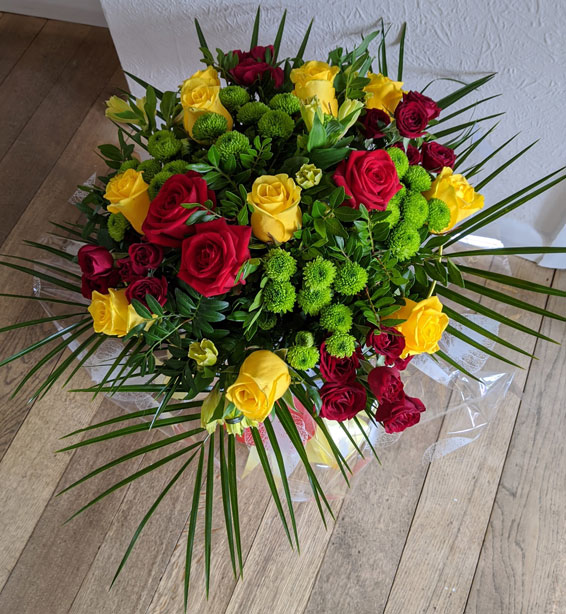 Oadby florist, Wigston florist, Red and yellow roses with green chrysanthemums, handtied bouquet