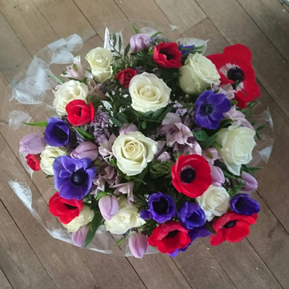 Oadby florist, Wigston florist, White avalanche roses, red and blue anemones, lilac tulips, handtied bouquet
