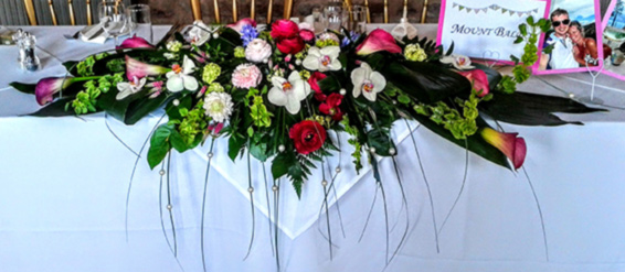 Oadby florist, Wigston Florist, Leicester wedding flowers, Top table wedding flowers, orchids, calla lilies, ranunculus, pearls