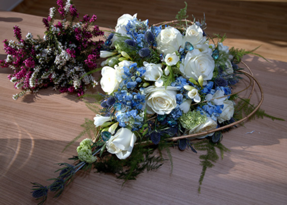 Oadby florist, Wigston Florist, Leicester wedding flowers, blue & white heart shaped wedding bouquet, with hydrangea, eryngium, roses