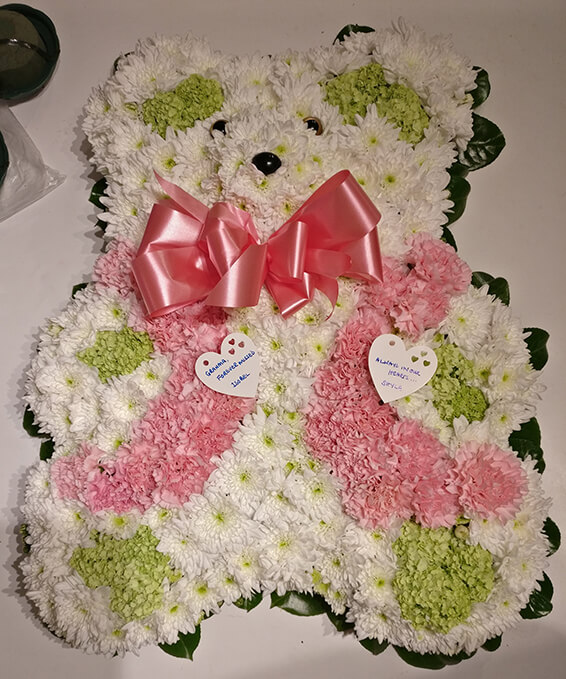Oadby funeral flowers, Wigston funeral flowers, Large Teddy bear tribute, white & pink flowers
