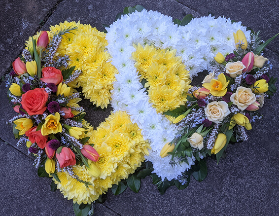 Oadby Funeral Flowers, Wigston Funeral Flowers, Market Harborough Funeral Flowers, Leicester Funeral Flowers, Double open Heart Tribute, lemon & white flowers.