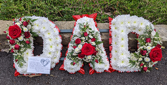 Oadby Funeral flowers, Wigston Funeral Flowers, Market Harborough Funeral Flowers, Leicester Funeral Flowers, DAD tribute, red and white flowers, Liverpool Football club tribute.
