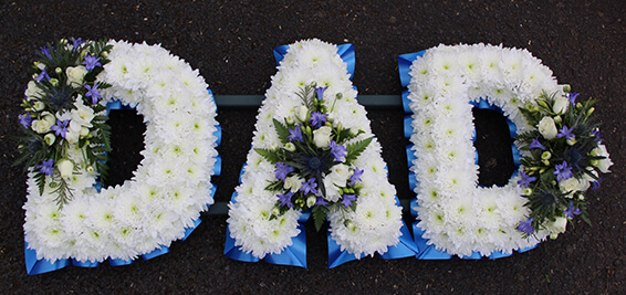 Oadby Funeral flowers, Wigston Funeral Flowers, Market Harborough Funeral Flowers, Leicester Funeral Flowers, Large calligraphy letter tribute.