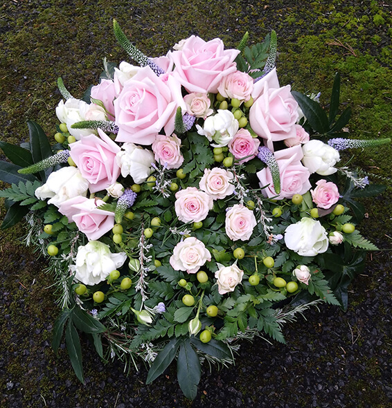 Oadby Funeral Flowers, Wigston Funeral Flowers, Market Harborough Funeral Flowers, Posy Tribute, Contemporary round posy cushion, with baby pink roses, berries & other flowers. Very stylish