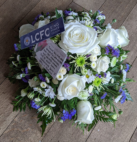 Oadby Funeral Flowers, Wigston Funeral Flowers, Market Harborough Funeral Flowers, Posy Tribute, Blue & White flower posy arrngement for Leicester City Football fan with club badge