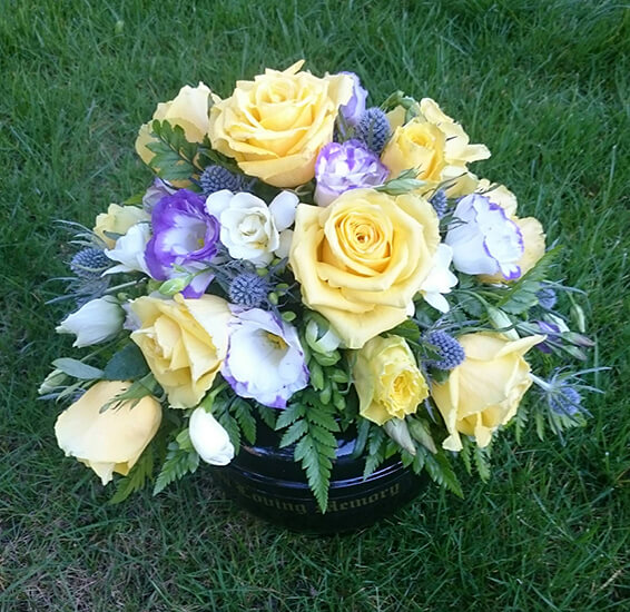 Oadby Funeral Flowers, Wigston Funeral Flowers, Market Harborough Funeral Flowers, Posy Tribute lemon, white & lilace posy arrnagement in garve vase