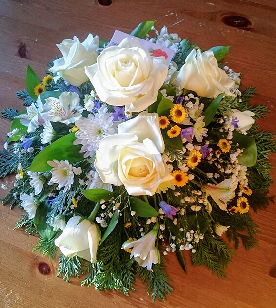 Oadby Funeral Flowers, Wigston Funeral Flowers, Market Harborough Funeral Flowers, Posy Tribute, White & lemon flowers in a traditional posy arrangement suitable for a grave