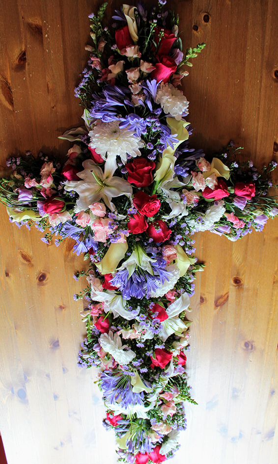 Oadby funeral flowers, Wigston funeral flowers, Colourful Natural burial Cross Tribute.