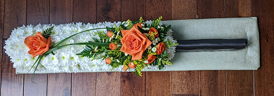 Oadby funeral flowers, Wigston funeral flowers, Market Harborough Funeral Flowers, Cricket bat funeral tribute, with spray.