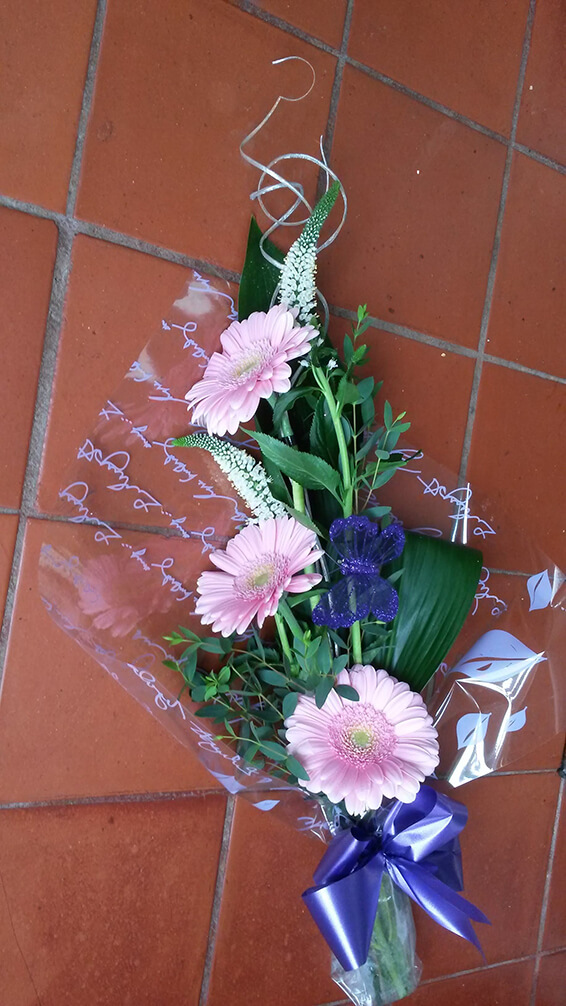 Oadby Funeral Flowers, Wigston Funeral Flowers, Market Harborough Funeral Flowers, Small Tied Sheaf Tribute with pink gerbera