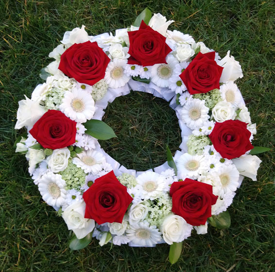 Oadby Funeral Flowers, Wigston Funeral Flowers, Wreath ring Sympathy Tribute, red and white flowers