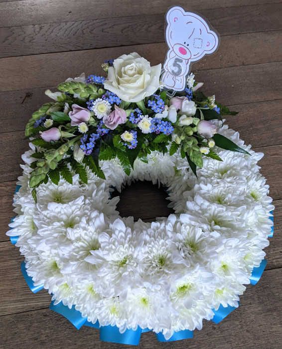 Oadby Funeral Flowers, Wigston Funeral Flowers, Wreath ring Sympathy Tribute, traditional style, blue