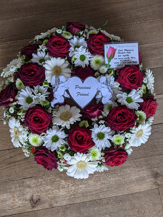 Oadby Funeral Flowers, Wigston Funeral Flowers, Market Harborough Funeral Flowers, Wreath ring Sympathy Tribute, red and white flowers