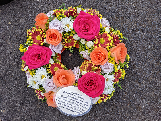 Oadby Funeral Flowers, Wigston Funeral Flowers, Market Harborough Funeral Flowers, Wreath ring Sympathy Tribute, vibrant flowers