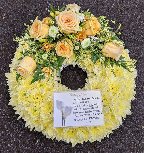 Oadby Funeral Flowers, Wigston Funeral Flowers, Market Harborough Funeral Flowers, Wreath ring Sympathy Tribute,tradition lemon with spray