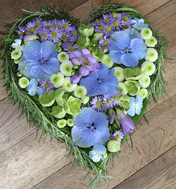 Oadby Funeral Flowers, Wigston Funeral Flowers, Market Harborough Funeral Flowers, Leicester Funeral Flowers, Contemporary Heart Tribute, Blue Lilac & green flowers with rosemary