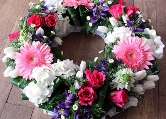 Oadby florist, Wigston florist, Leicester funeral flowers, Funeral wreath, pink gerbera, hydrangea, clematis,tulips