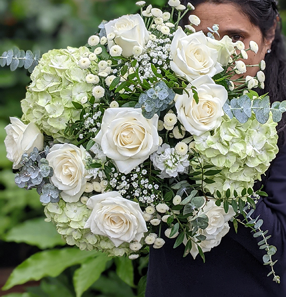 Jo Hammonds, Oadby florist, Wigston florist, Market Harborough Florist, Leicester Florist, with a contemporary Luxury bouquet, containing white roses & hydrangea created for supermodel Sharon Alexie E at LouisVuitton London/Paris