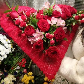 Oadby florist, Wigston Florist, Heart shaped bouquet, with red and white roses and silver butterflies