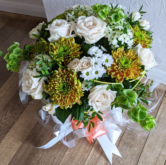 Oadby florist, Wigston florist, Bells of Ireland, white roses, seasonal flowers, handtied bouquet