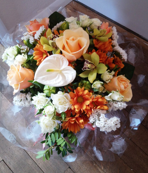 Oadby florist, Wigston florist, Peach roses and exotic anthurium, round handtied bouquet