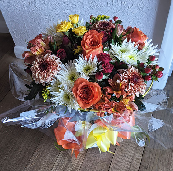Oadby florist, Wigston florist, Orange rose and mixed flower, round handtied bouquet
