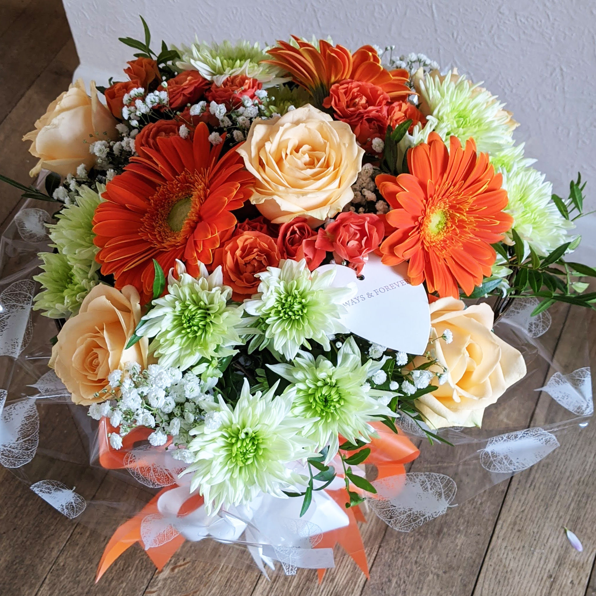 Oadby florist, Wigston florist, Orange gerbera, peach roses and mixed flower, handtied bouquet