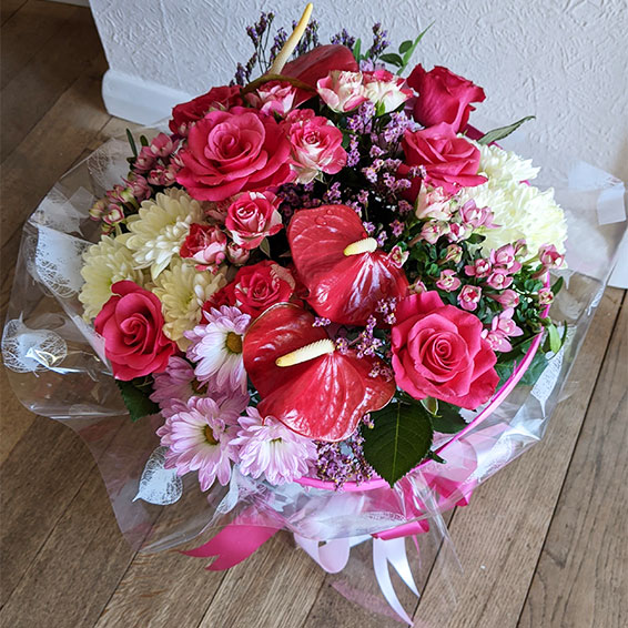 Oadby florist, Wigston florist, Hot pink roses, exotic anthuriums, bouvardia, handtied bouquet
