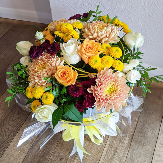 Oadby florist, Wigston florist, Orange and yellow mixed seasonal flower, round handtied bouquet