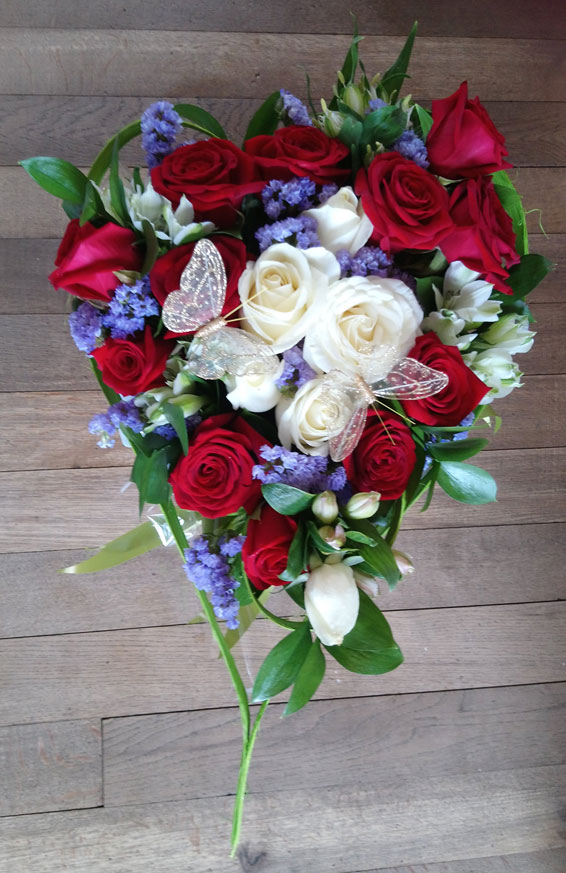 Oadby florist, Wigston florist, Heart shaped bouquet with red and white roses and butterflies