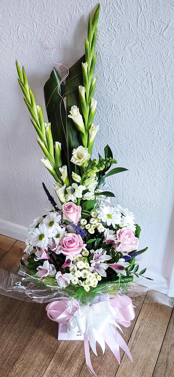 Oadby florist, Wigston florist, Pale pink roses, mixed white seasonal flowers, vertical handtied bouquet