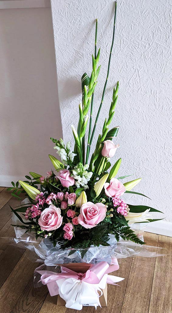 Oadby florist, Wigston florist, Pink Roses,lily, bouvardi, mixed white flower, vertical handtied bouquet