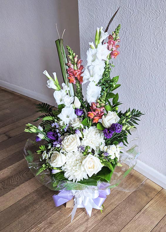 Oadby florist, Wigston florist, White, pruple and peach mixed flower, vertical handtied bouquet